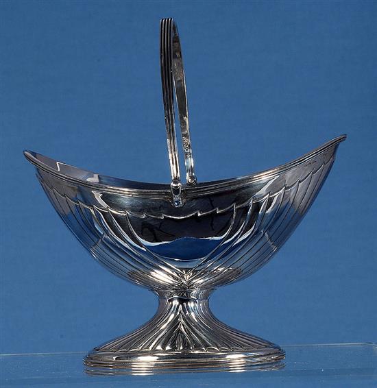 A Victorian silver oval boat shaped sugar basket, by John Newton Mappin, height over handle 172mm, weight